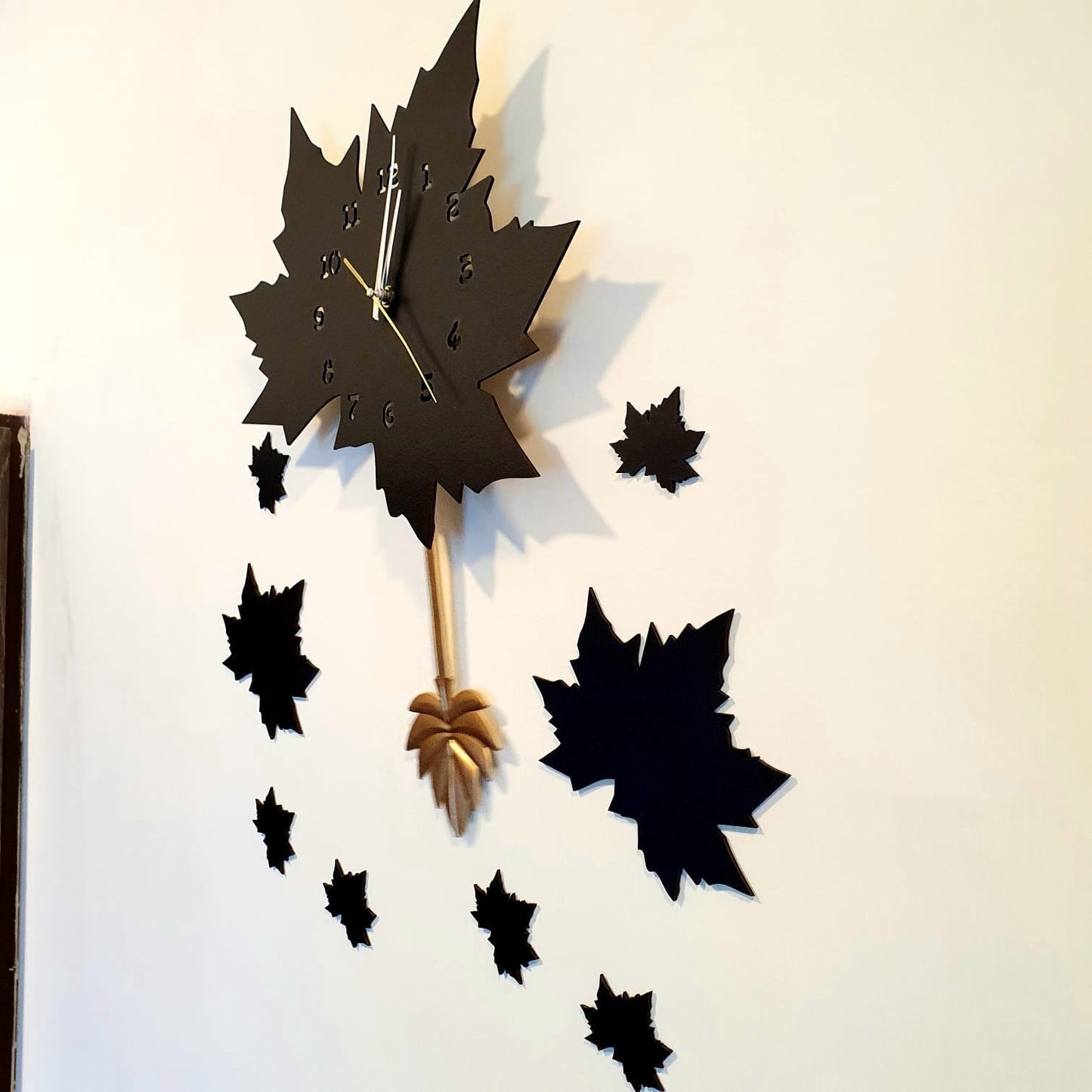 Black Maple Leaf Wall Clock with Pendulum